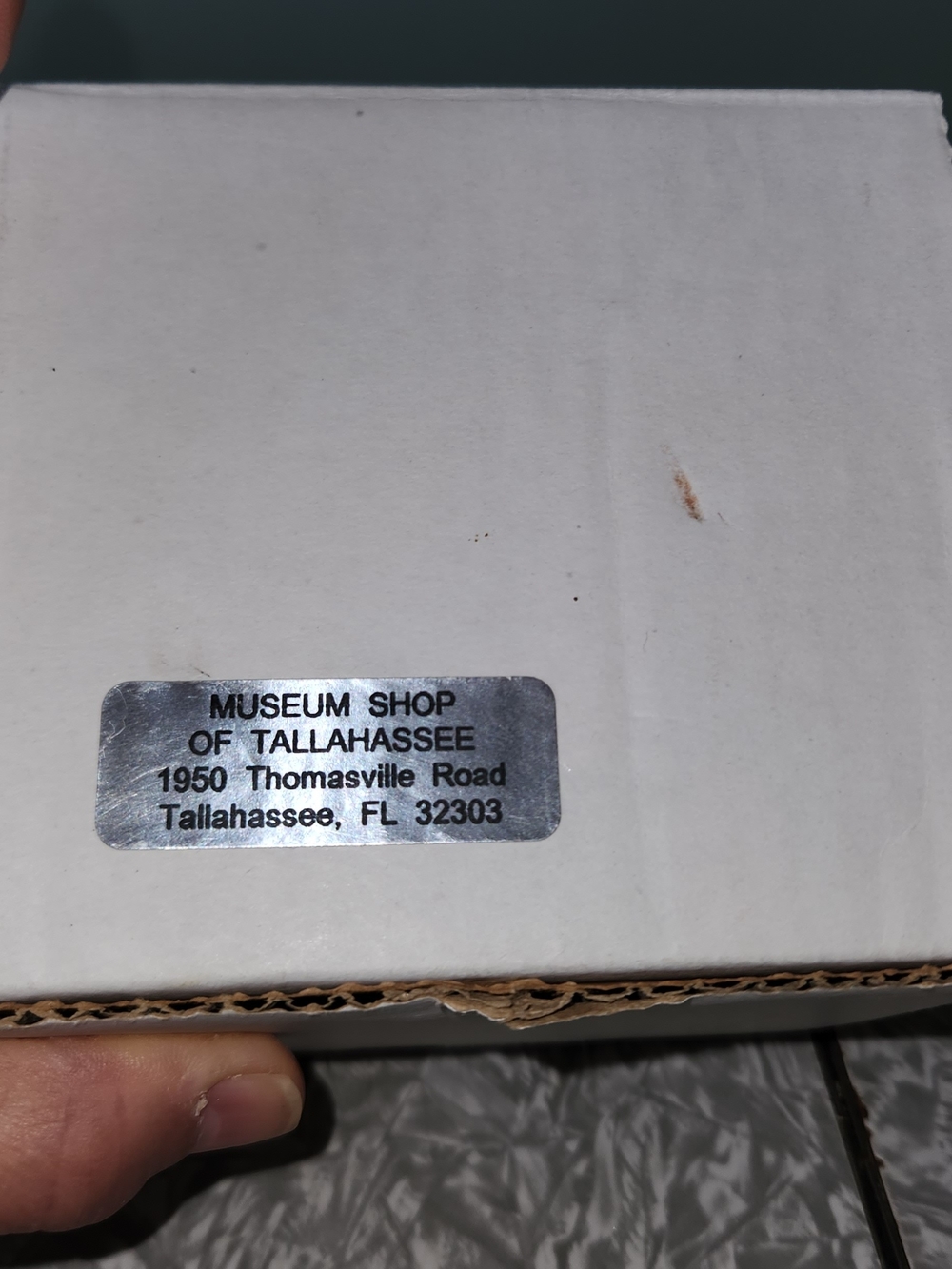 Source Unknown White Box with Silver Museum Shop Label